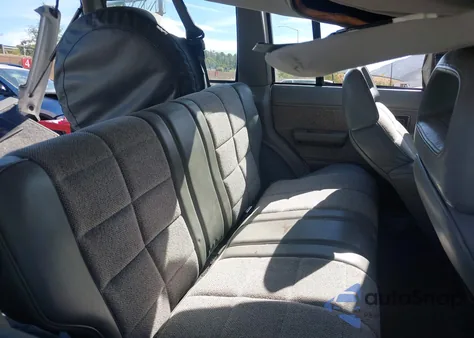 1990 Jeep Cherokee Laredo z USA, uszkodzony, nr VIN 1J4FJ58L7LL218582